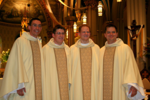 Father Pete (far left) at his ordination